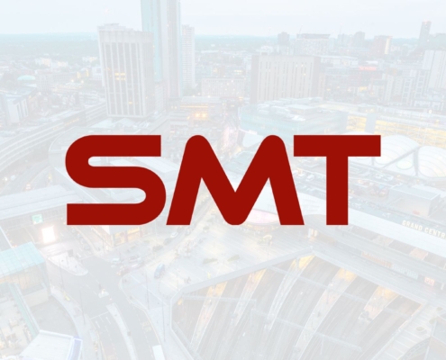 Birmingham cityscape with SMT logo in forefront.