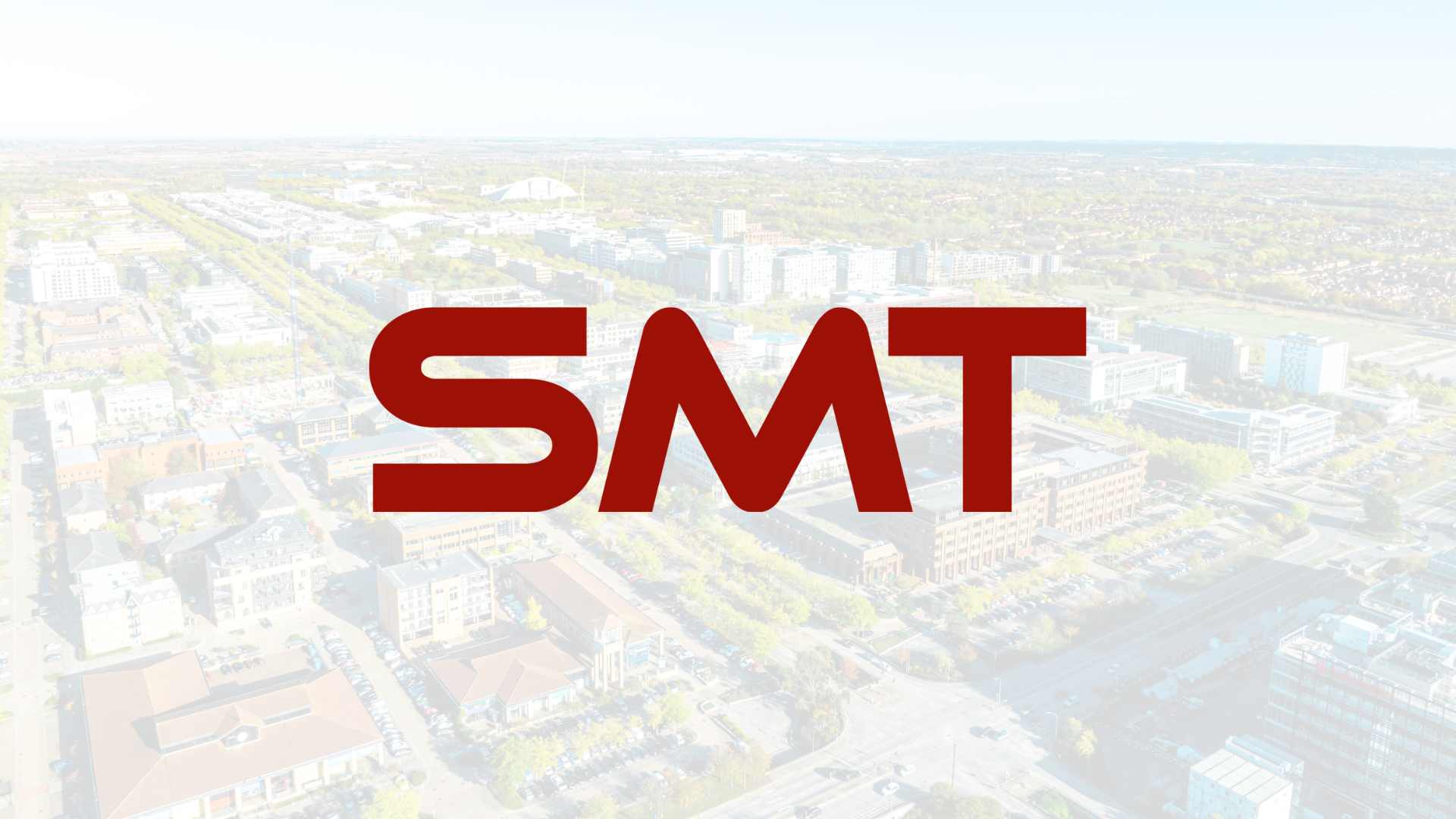 Milton Keynes cityscape with SMT logo in forefront.